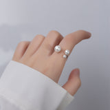 Bague ajustable en perles d'eau douce triple